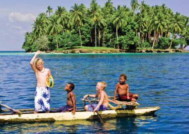 kids on a canoe ion still blue water